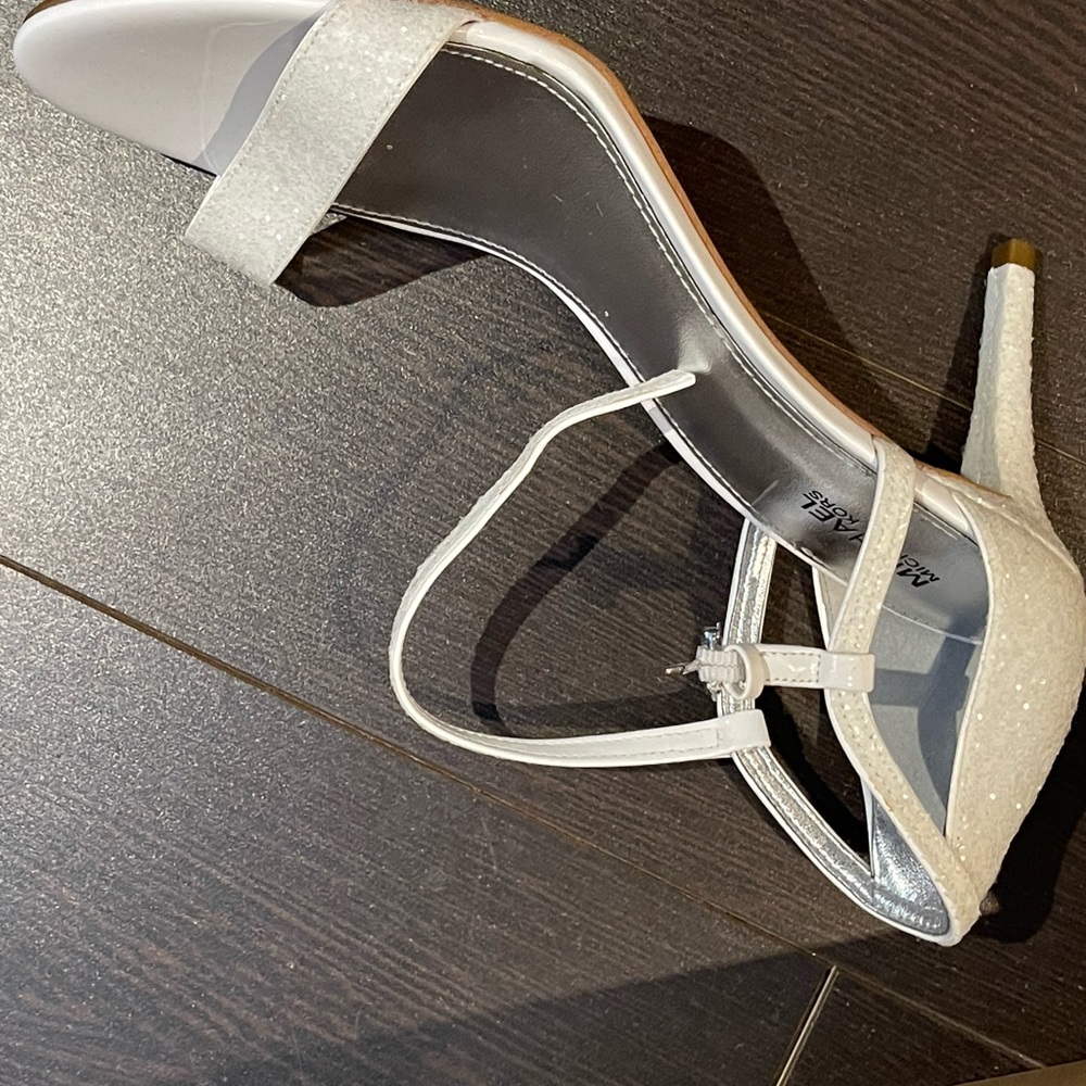 Michael Kor’s- optic white glitter heels.